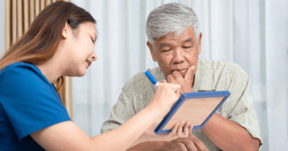 Researchers asked older adults with and without cognitive impairment to copy a sentence from a card, then write one from dictation — only the second task revealed a clear difference between the groups